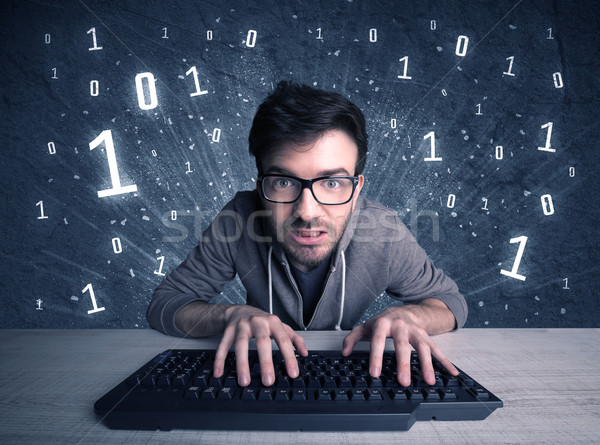 Stock photo: Online intruder geek guy hacking codes