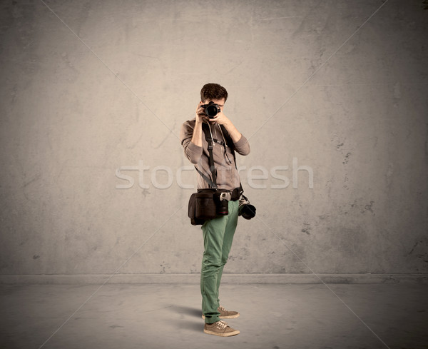 Hobby photographer holding camera Stock photo © ra2studio