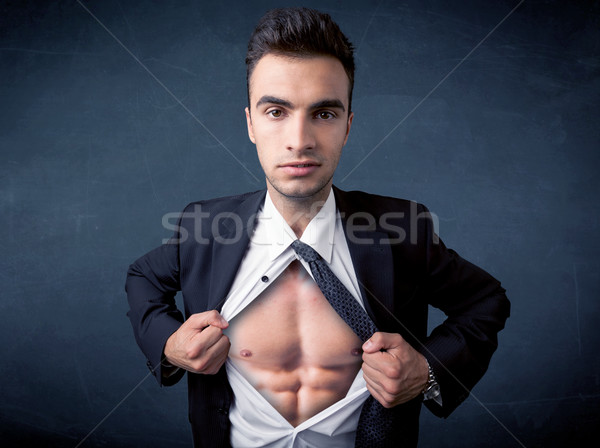 Businessman tearing off shirt and showing mucular body Stock photo © ra2studio
