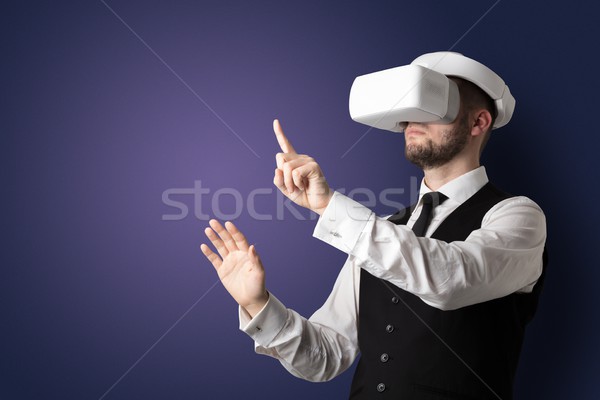 Empty room with a man in vr glasses Stock photo © ra2studio