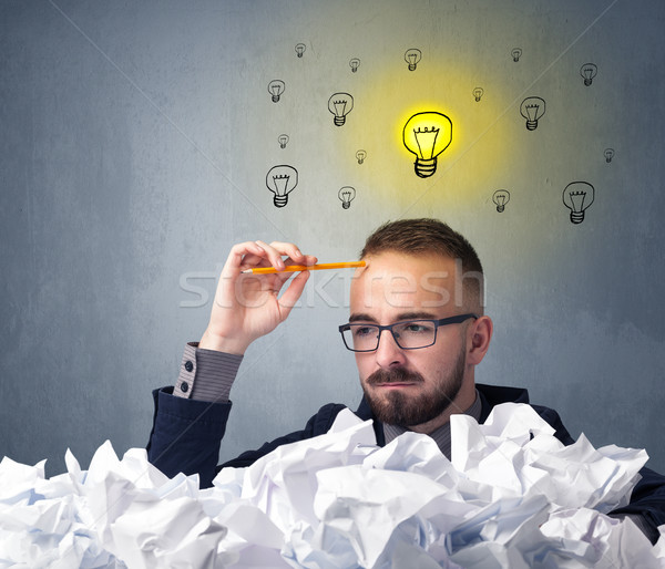 Businessman behind crumpled paper Stock photo © ra2studio