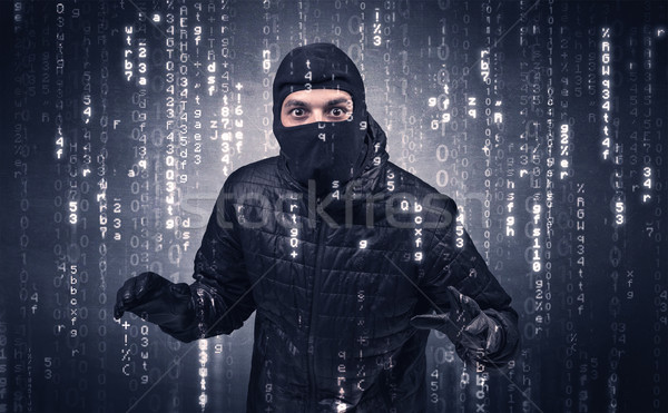 Burglar in action with encoded concept. Stock photo © ra2studio