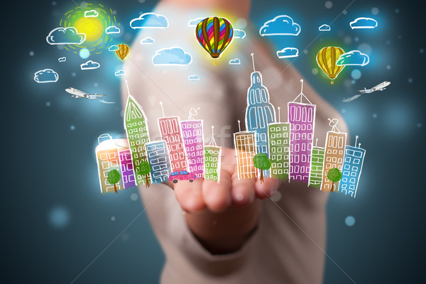 Young woman presenting colorful hand drawn metropolitan city Stock photo © ra2studio