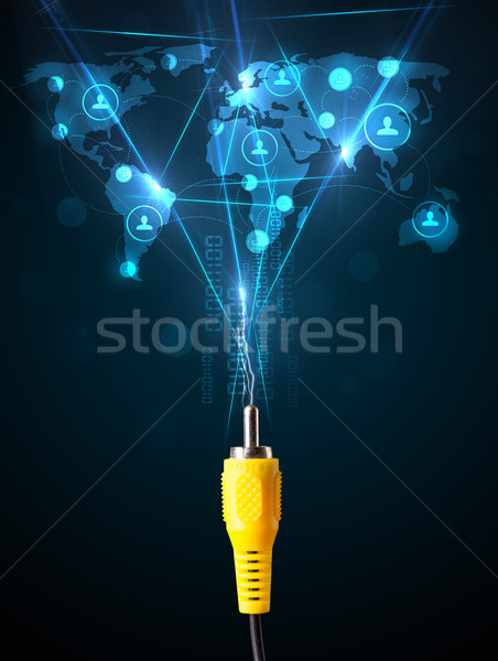 Social network icons coming out of electric cable Stock photo © ra2studio