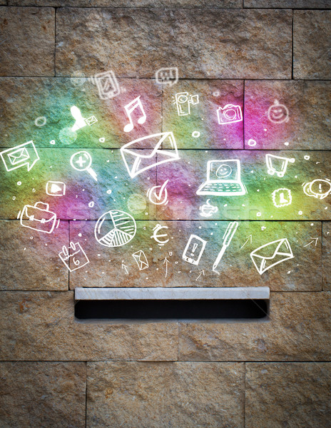 Colorful icons and symbols bursting out of a mailbox Stock photo © ra2studio