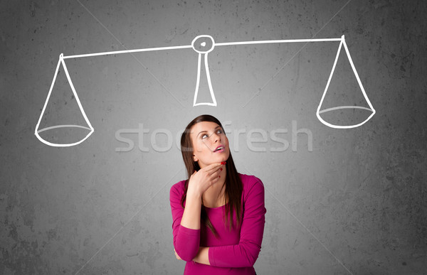 Young woman taking a decision Stock photo © ra2studio