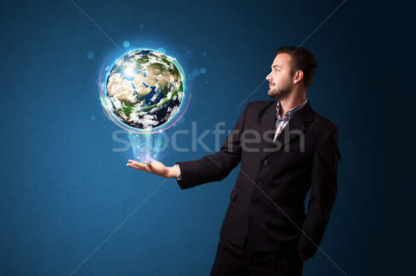 Stockfoto: Zakenman · aarde · wereldbol · jonge