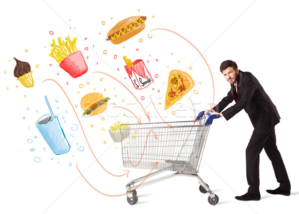 ストックフォト: 男 · ショッピングカート · 毒性 · ビジネスマン · プッシング