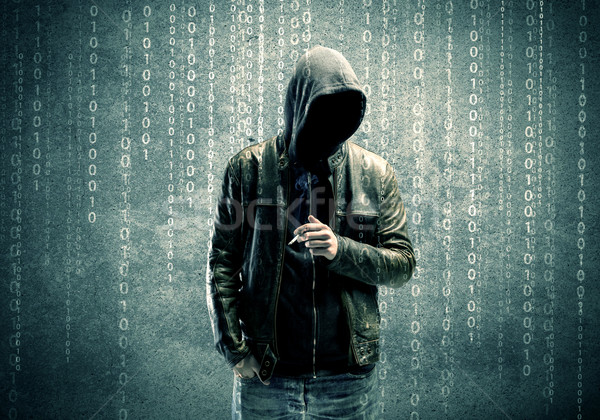 Stock photo: Angry mysterious hacker with numbers