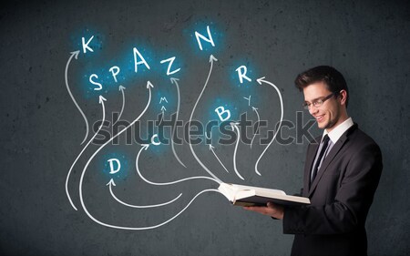 Businessman holding a white cup with lines and arrows Stock photo © ra2studio