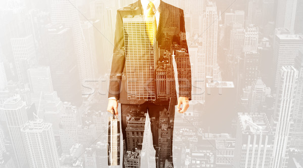 Business person with warm color overlay of city background Stock photo © ra2studio