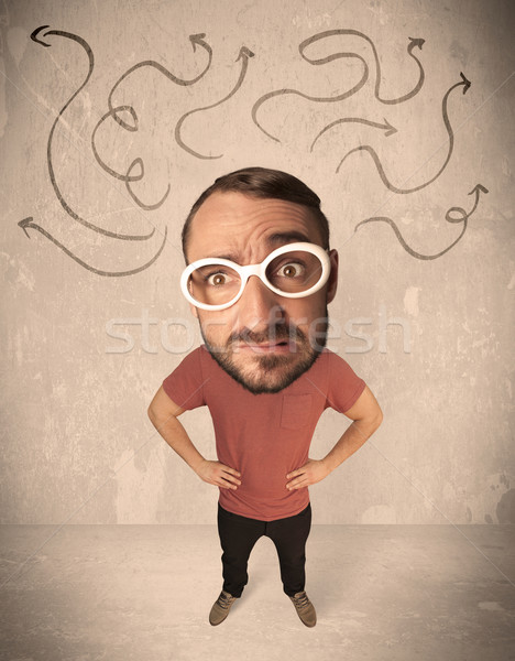 Big head person with arrows Stock photo © ra2studio