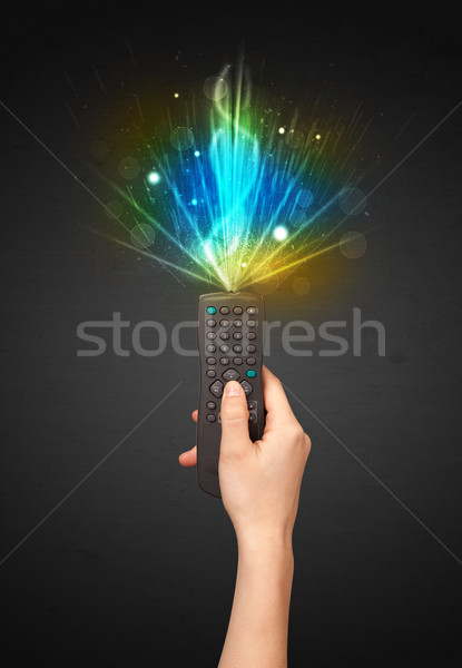 Mão controle remoto explosivo sinalizar brilhante Foto stock © ra2studio