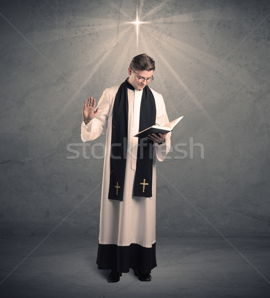 молодые священник благословение мужчины черно белые серый Сток-фото © ra2studio