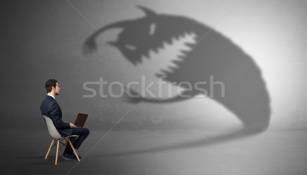 Biznesmen potwora cień młodych człowiek tle Zdjęcia stock © ra2studio