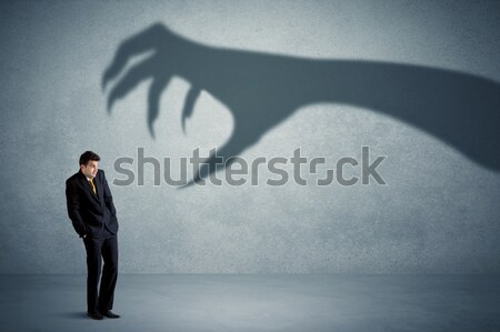 üzletember harcol nagy szörny árnyék boxkesztyű Stock fotó © ra2studio