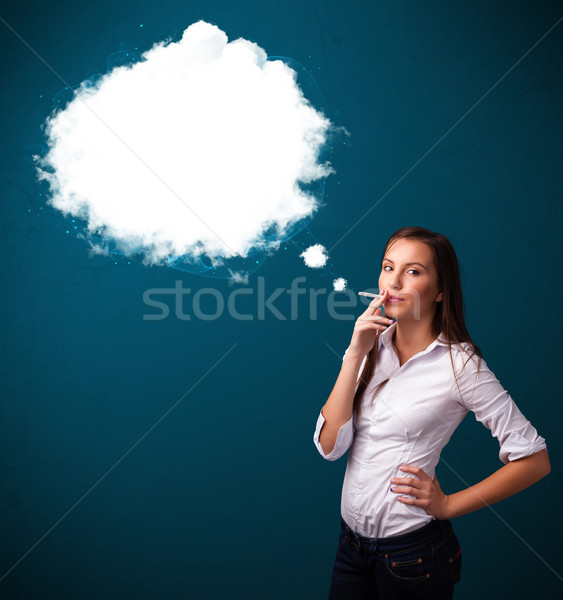 Stock photo: Young woman smoking unhealthy cigarette with dense smoke