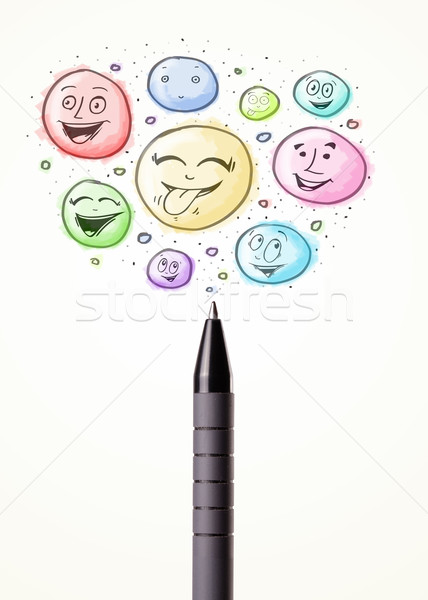 Smiley faces coming out of pen Stock photo © ra2studio