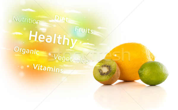 Colorful juicy fruits with healthy text and signs  Stock photo © ra2studio