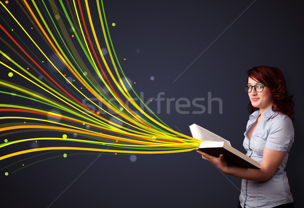 Joli jeune femme lecture livre coloré lignes [[stock_photo]] © ra2studio