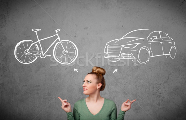 Woman making a choice between bicycle and car Stock photo © ra2studio