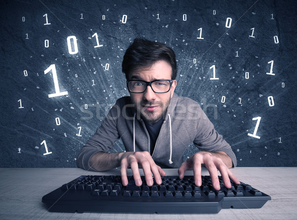 Online intruder geek guy hacking codes Stock photo © ra2studio