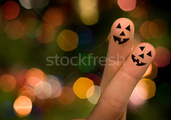 Halloween pumpkin finger hug Stock photo © ra2studio
