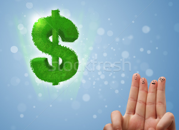 Mutlu parmaklar bakıyor yeşil yaprak dolar işareti Stok fotoğraf © ra2studio