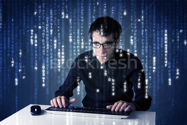 Hacker decoding information from futuristic network technology Stock photo © ra2studio