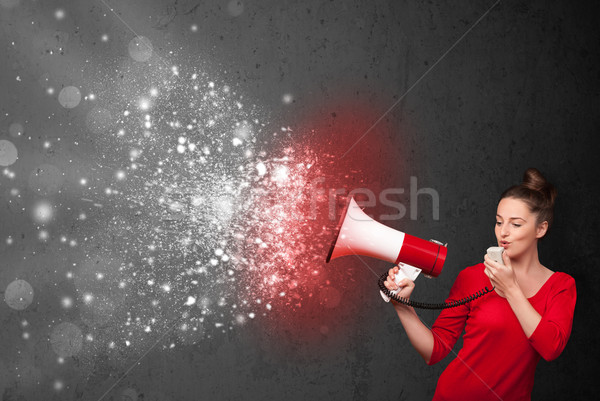 Nő kiált megafon izzó energia részecskék Stock fotó © ra2studio