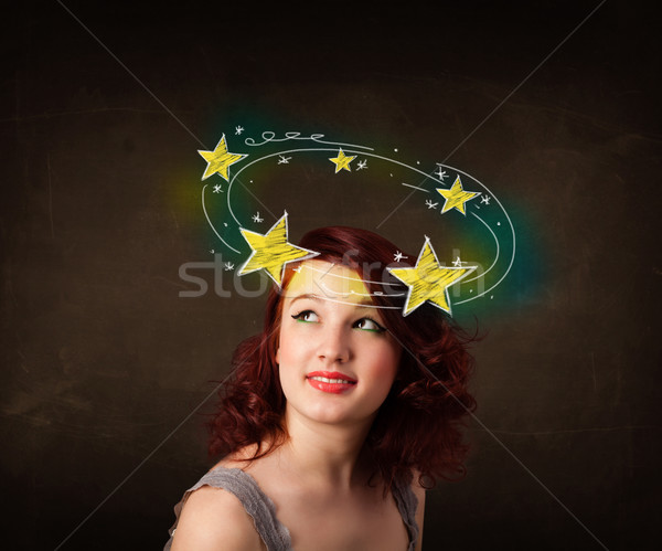 girl with yellow stars circleing around her head illustration Stock photo © ra2studio