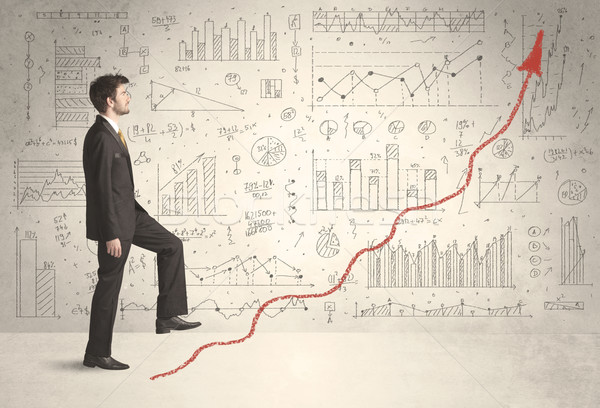 Business man climbing on red graph arrow concept Stock photo © ra2studio