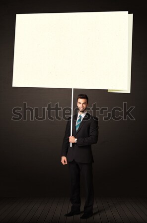 Zakenman boekje papier jonge groot Stockfoto © ra2studio