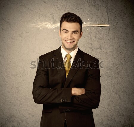 Fast creative sales guy with smoking bullet Stock photo © ra2studio