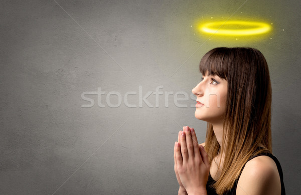 Modląc młoda dziewczyna młoda kobieta szary błyszczący żółty Zdjęcia stock © ra2studio