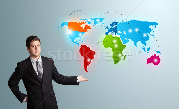 Młody człowiek kolorowy mapie świata przystojny świecie Zdjęcia stock © ra2studio