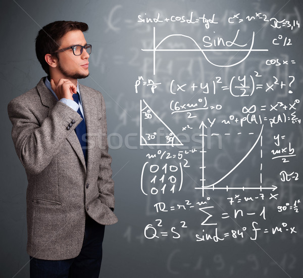 Knap schooljongen denken complex wiskundig borden Stockfoto © ra2studio