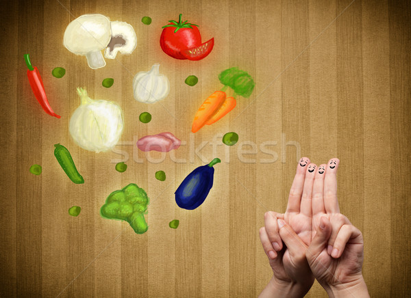 Happy smiley face fingers cheerfully looking at illustration of colorful healthy vegetables Stock photo © ra2studio