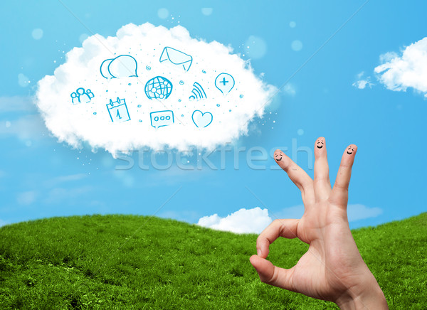 Happy cheerful smiley fingers looking at cloud with blue social icons and smybols Stock photo © ra2studio
