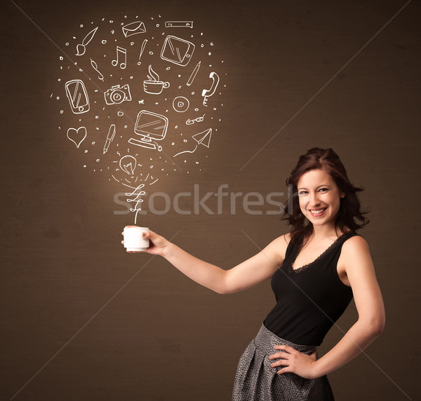 Businesswoman holding a white cup with social media icons Stock photo © ra2studio