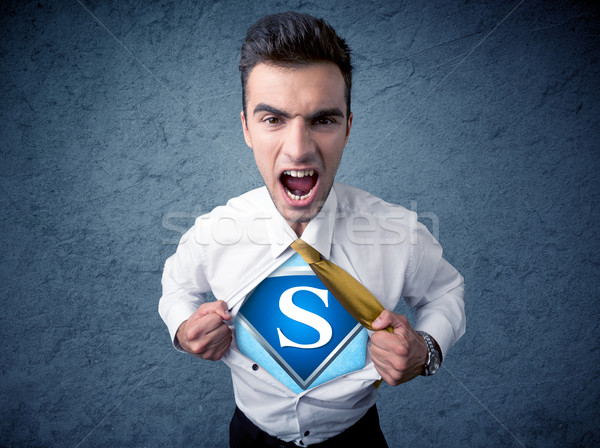 Businessman ripping off his shirt with superhero sign  Stock photo © ra2studio