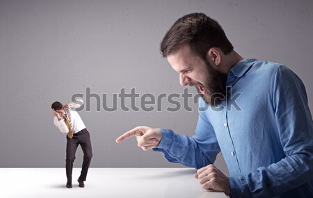 Businessman with kisses on his face in an empty space Stock photo © ra2studio