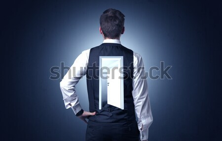 Stock photo: Businessman standing with door on his back