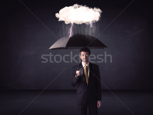 Stockfoto: Zakenman · permanente · paraplu · weinig · storm · wolk