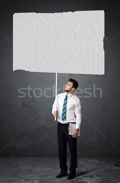 Businessman with blank booklet paper Stock photo © ra2studio