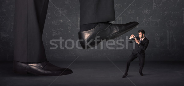 Enorme gamba minuscolo uomo sfondo suit Foto d'archivio © ra2studio