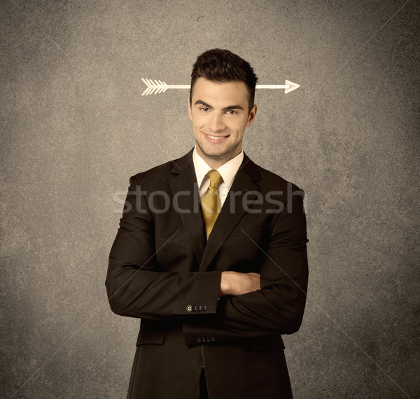 Young sales guy with arrow in the head Stock photo © ra2studio