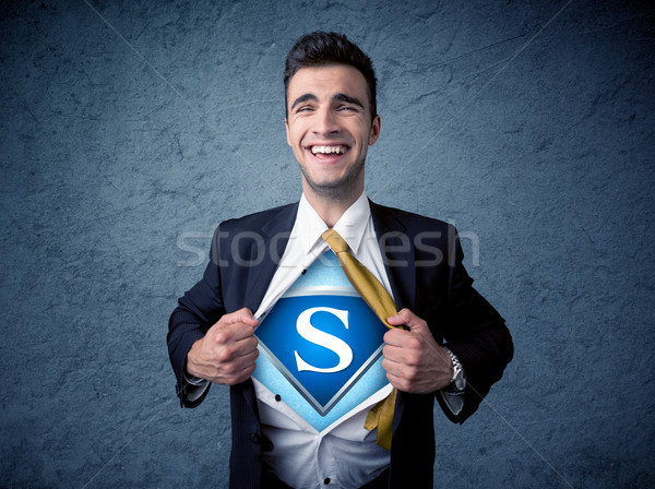 Businessman ripping off his shirt with superhero sign  Stock photo © ra2studio