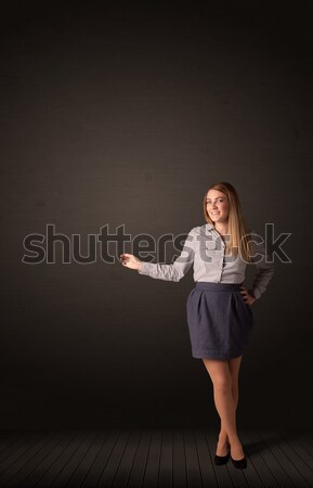 Businesswoman making gestures Stock photo © ra2studio