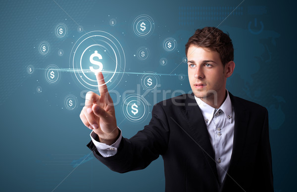 Businessman pressing modern business type of buttons Stock photo © ra2studio